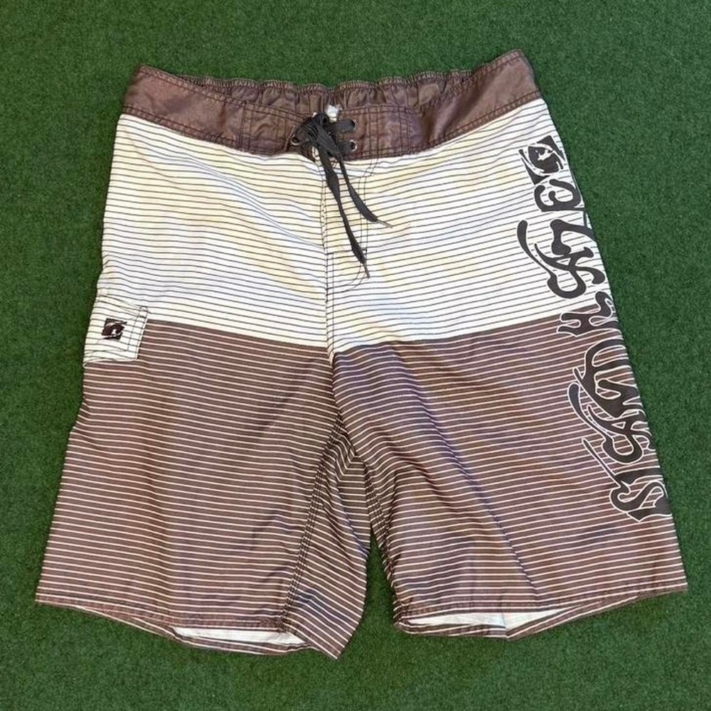 Brown + white striped board shorts Brand : Island Daze